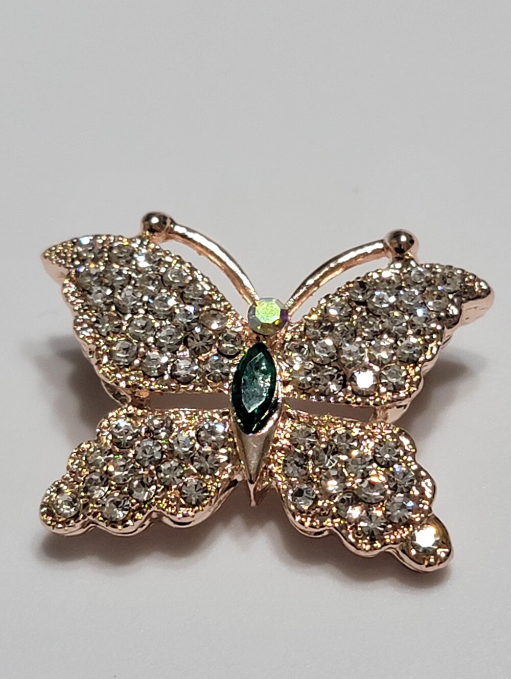 Fashion Jewelry Rose Gold Butterfly Brooch with Clear Crystals and Green Accent